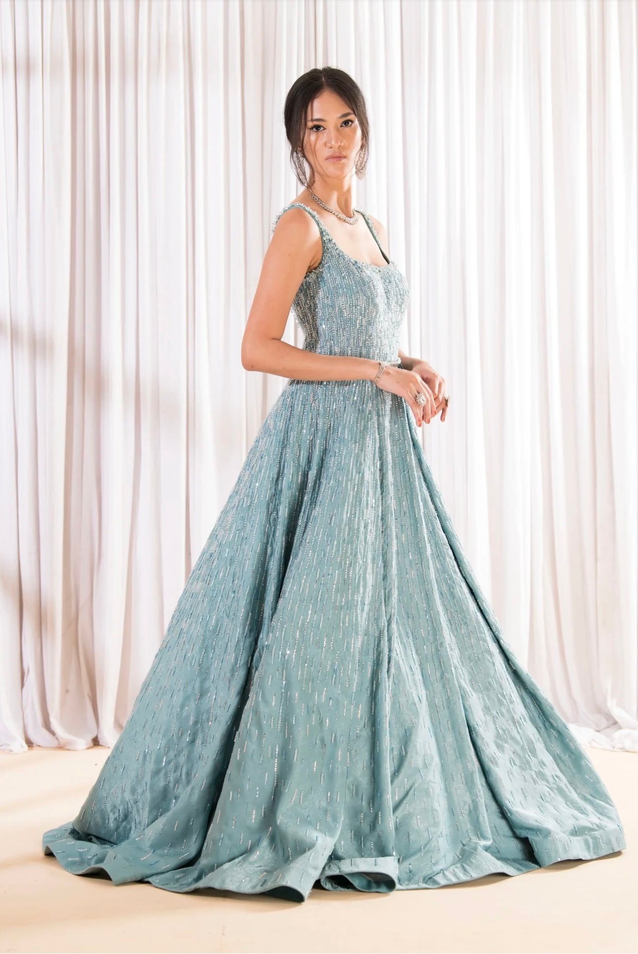 SEA GREEN SEQUIN AND CRYSTAL EMBELLISHED COWN